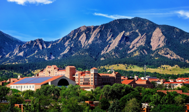 University of CO Boulder A skyscraper in a city.